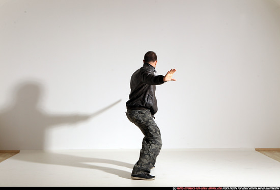 Man Adult Athletic White Fighting with sword Moving poses Casual