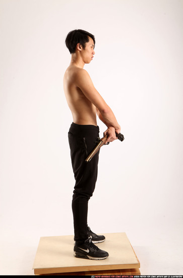 Man Young Athletic Fighting with gun Standing poses Pants Asian