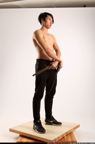 Man Young Athletic Fighting with gun Standing poses Pants Asian