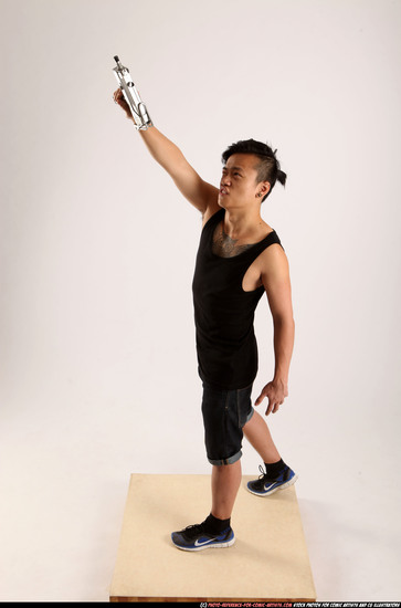 Man Young Athletic Fighting with submachine gun Standing poses Casual Asian