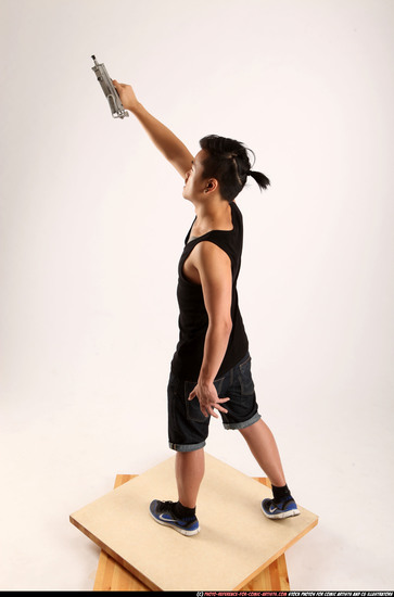 Man Young Athletic Fighting with submachine gun Standing poses Casual Asian