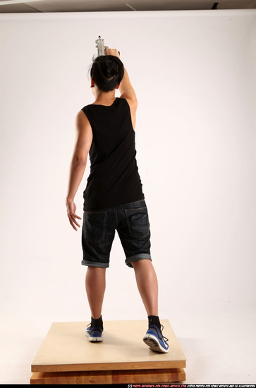 Man Young Athletic Fighting with submachine gun Standing poses Casual Asian