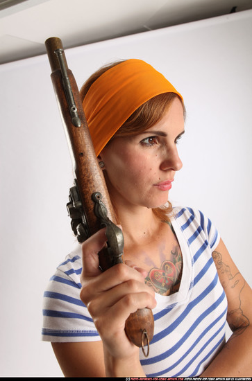 Woman Adult Average White Fighting with gun Standing poses Casual