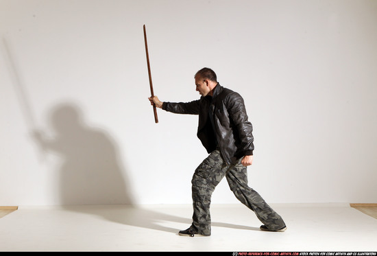 Man Adult Athletic White Fighting with sword Moving poses Casual