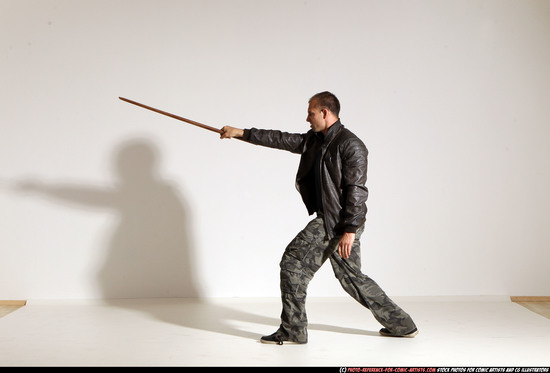 Man Adult Athletic White Fighting with sword Moving poses Casual