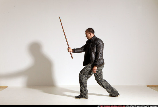 Man Adult Athletic White Fighting with sword Moving poses Casual