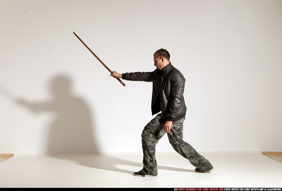 Man Adult Athletic White Fighting with sword Moving poses Casual