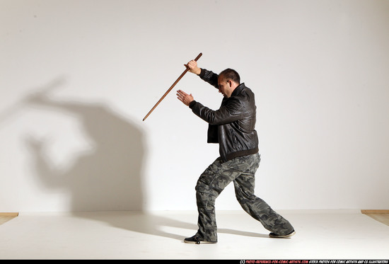 Man Adult Athletic White Fighting with sword Moving poses Casual