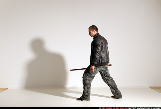 Man Adult Athletic White Fighting with sword Moving poses Casual