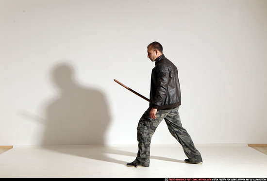 Man Adult Athletic White Fighting with sword Moving poses Casual