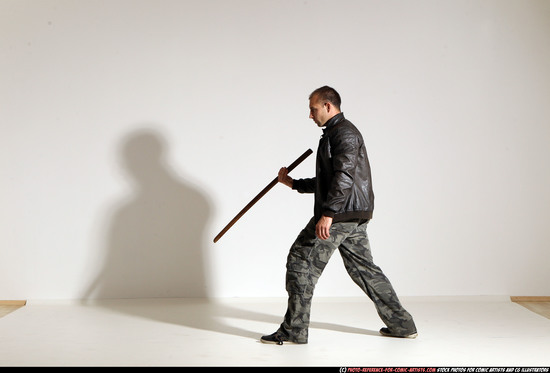 Man Adult Athletic White Fighting with sword Moving poses Casual