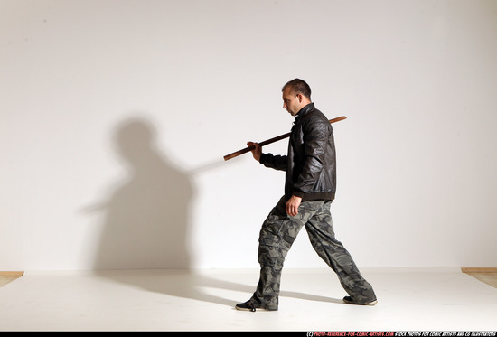 Man Adult Athletic White Fighting with sword Moving poses Casual