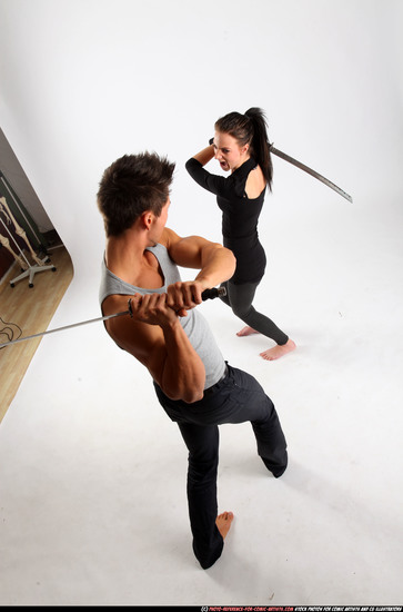 Man & Woman Adult Athletic White Fighting with sword Standing poses Casual