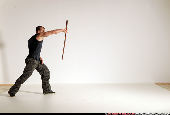 Man Adult Athletic White Fighting with sword Moving poses Casual