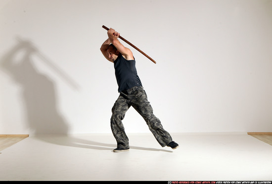 Man Adult Athletic White Fighting with sword Moving poses Casual