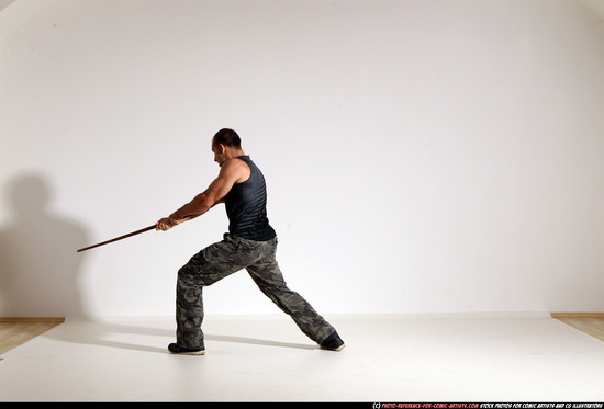 Man Adult Athletic White Fighting with sword Moving poses Casual