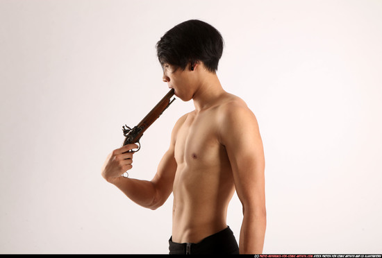 Man Young Athletic Fighting with gun Standing poses Pants Asian