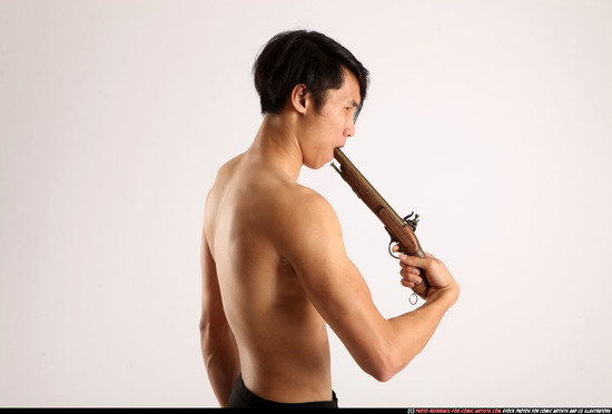 Man Young Athletic Fighting with gun Standing poses Pants Asian