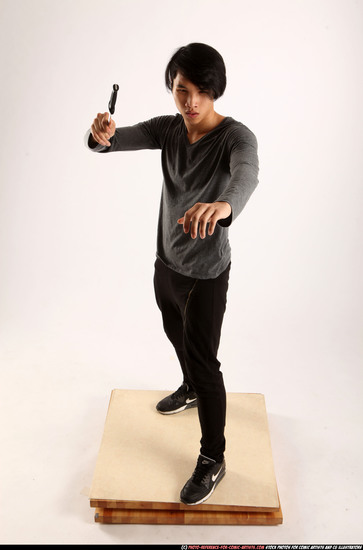 Man Young Athletic Fighting with knife Standing poses Casual Asian