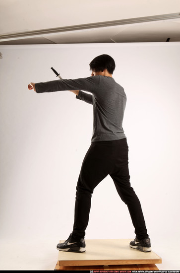 Man Young Athletic Fighting with knife Standing poses Casual Asian