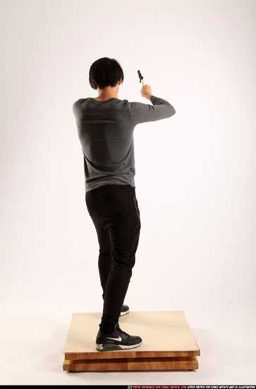 Man Young Athletic Fighting with knife Standing poses Casual Asian