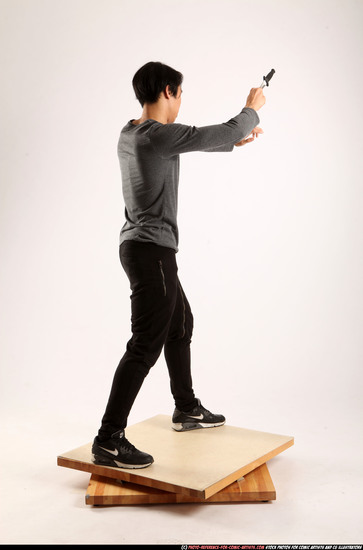 Man Young Athletic Fighting with knife Standing poses Casual Asian