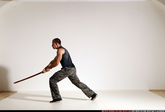 Man Adult Athletic White Fighting with sword Moving poses Casual