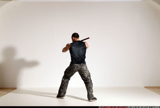 Man Adult Athletic White Fighting with sword Moving poses Casual