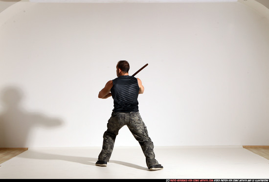 Man Adult Athletic White Fighting with sword Moving poses Casual