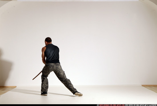 Man Adult Athletic White Fighting with sword Moving poses Casual