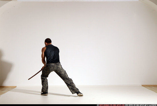 Man Adult Athletic White Fighting with sword Moving poses Casual