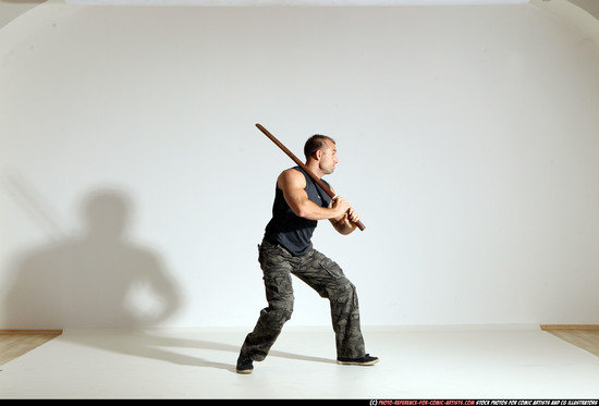 Man Adult Athletic White Fighting with sword Moving poses Casual