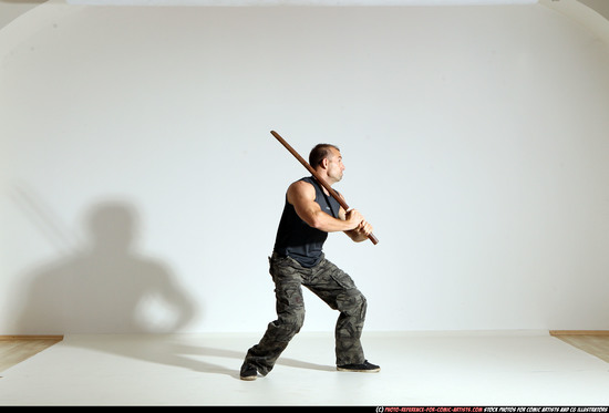 Man Adult Athletic White Fighting with sword Moving poses Casual