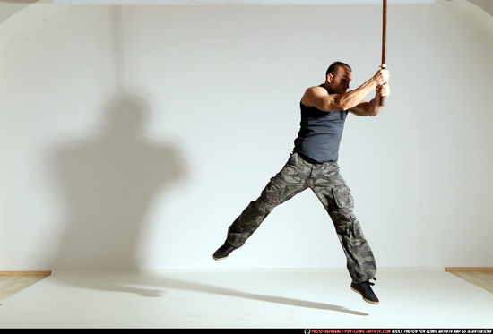 Man Adult Athletic White Fighting with sword Moving poses Casual