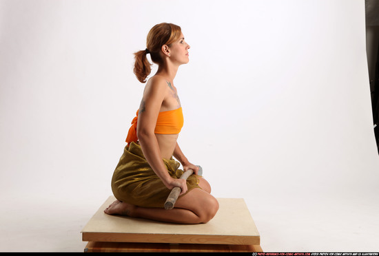 Woman Adult Athletic White Fighting with spear Sitting poses Army