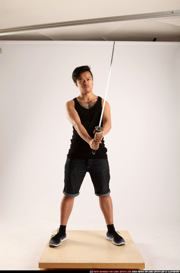 Man Young Athletic Fighting with sword Standing poses Casual Asian