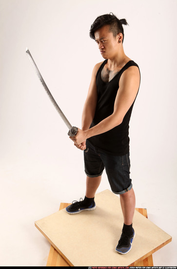 Man Young Athletic Fighting with sword Standing poses Casual Asian