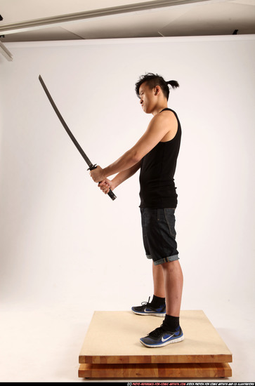 Man Young Athletic Fighting with sword Standing poses Casual Asian