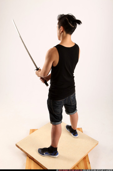 Man Young Athletic Fighting with sword Standing poses Casual Asian