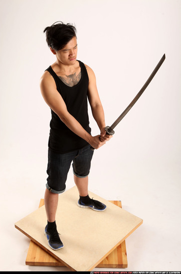 Man Young Athletic Fighting with sword Standing poses Casual Asian