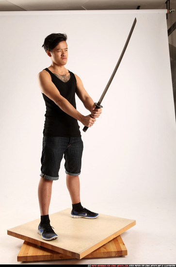 Man Young Athletic Fighting with sword Standing poses Casual Asian