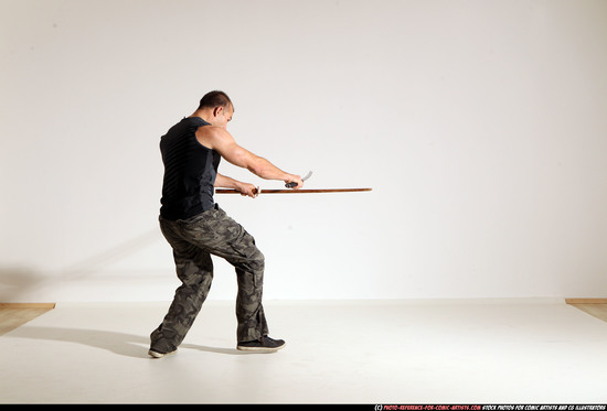 Man Adult Athletic White Fighting with sword Moving poses Casual