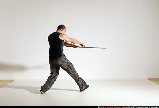 Man Adult Athletic White Fighting with sword Moving poses Casual