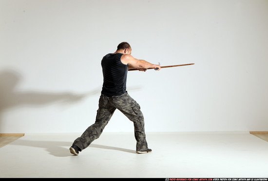 Man Adult Athletic White Fighting with sword Moving poses Casual