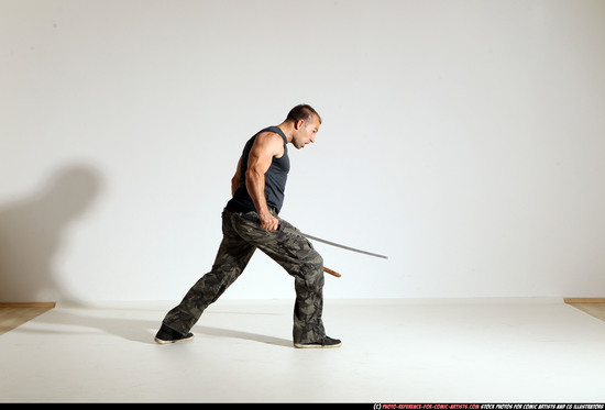 Man Adult Athletic White Fighting with sword Moving poses Casual