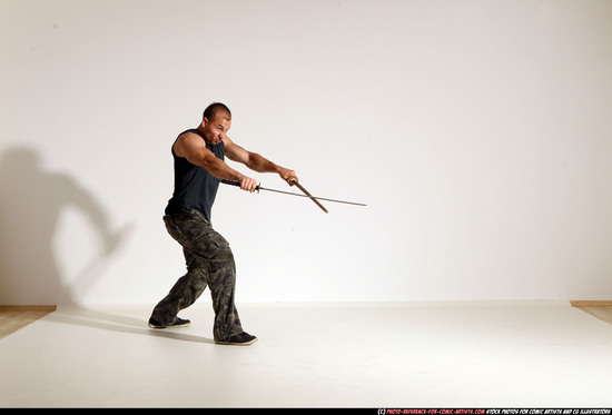 Man Adult Athletic White Fighting with sword Moving poses Casual