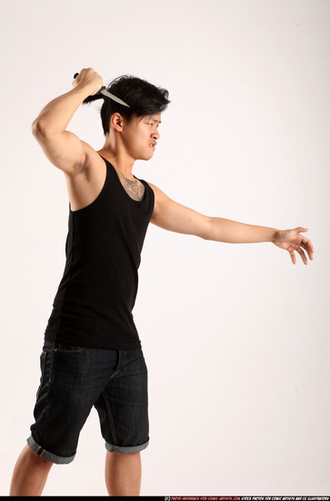 Man Young Athletic Fighting with knife Standing poses Casual Asian