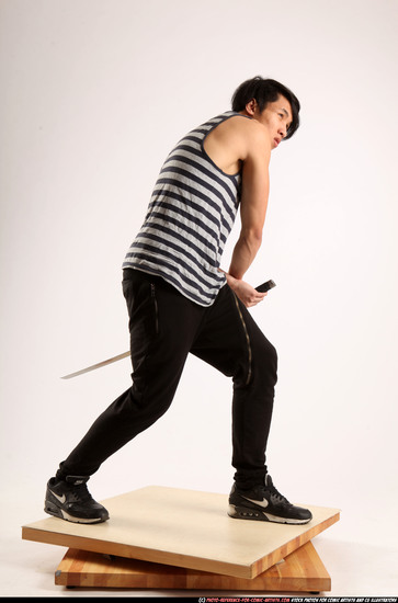 Man Young Athletic Fighting with sword Standing poses Casual Asian