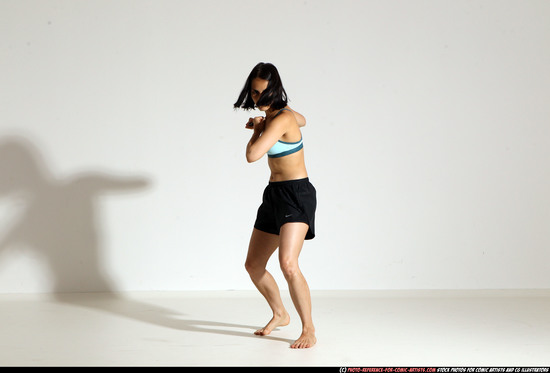 Woman Young Athletic White Fighting with knife Moving poses Casual