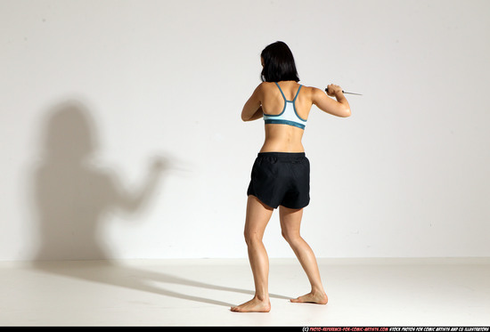 Woman Young Athletic White Fighting with knife Moving poses Casual